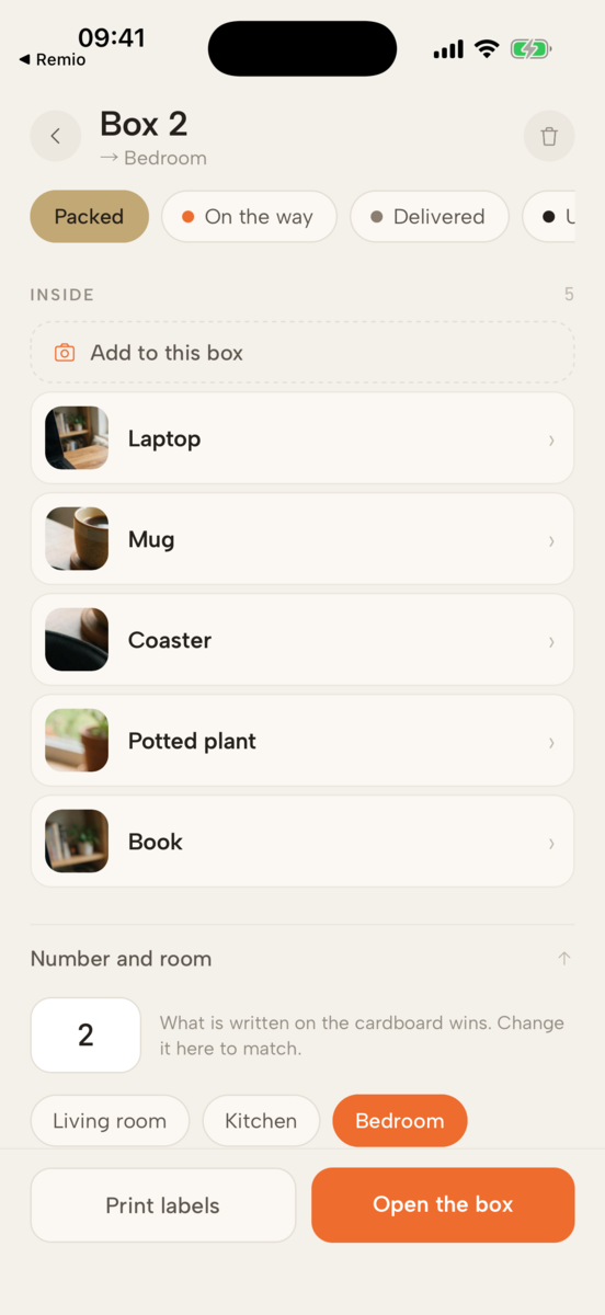 Inside box 2: a laptop, a mug, a coaster, a potted plant and a book, each with its own photo